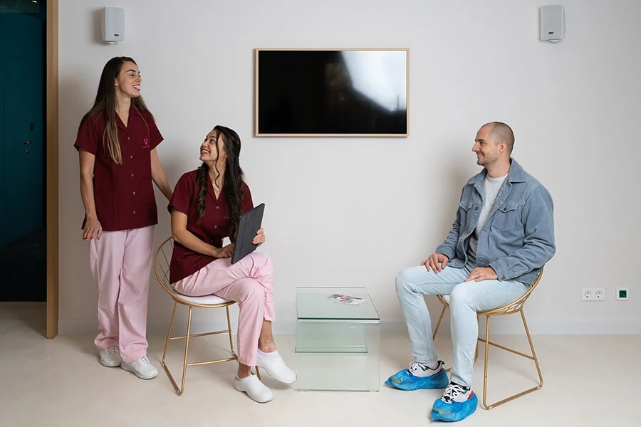 Dentists and patient in the waiting room